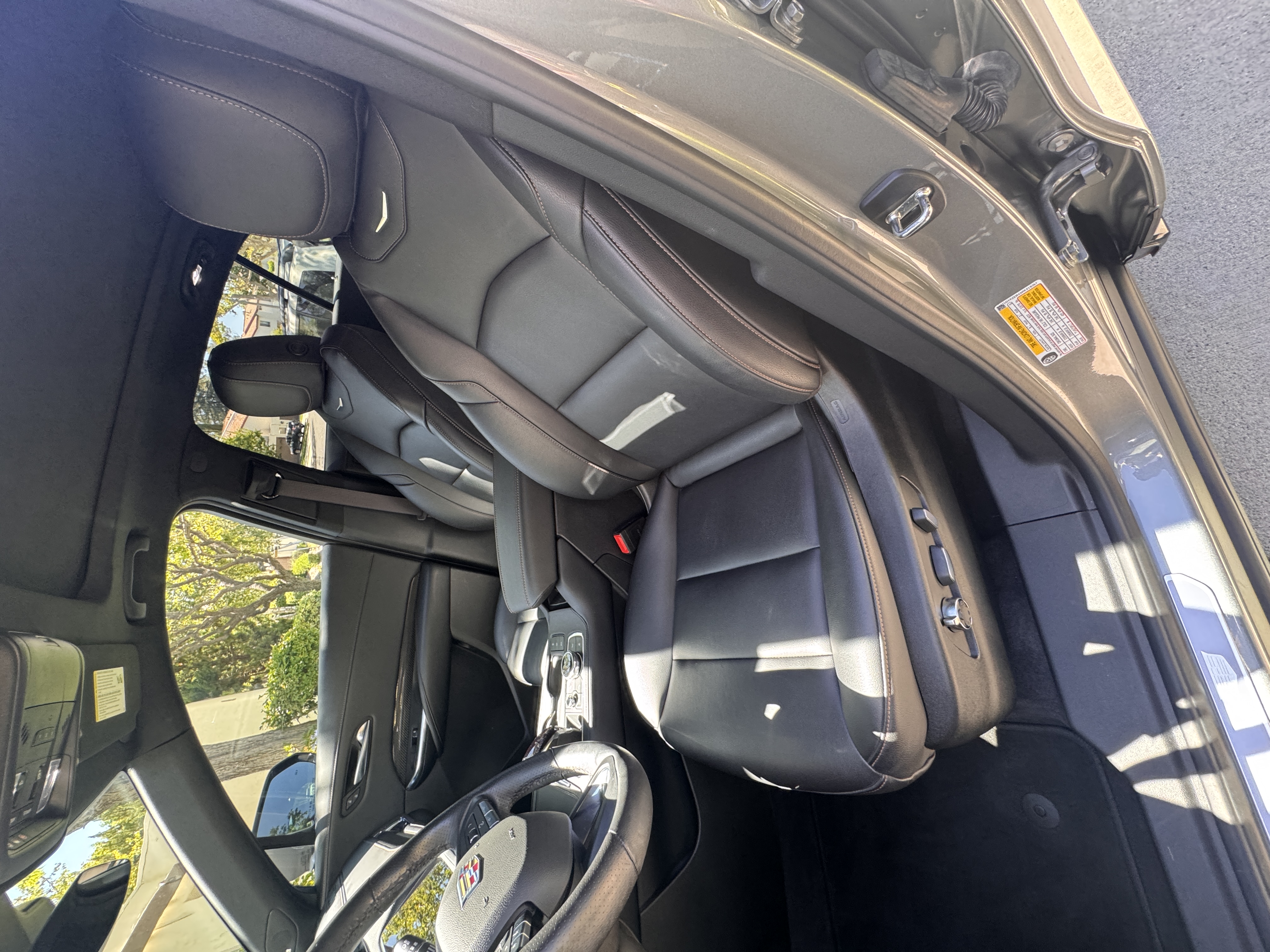 Clean Cadillac front seats after interior detailing