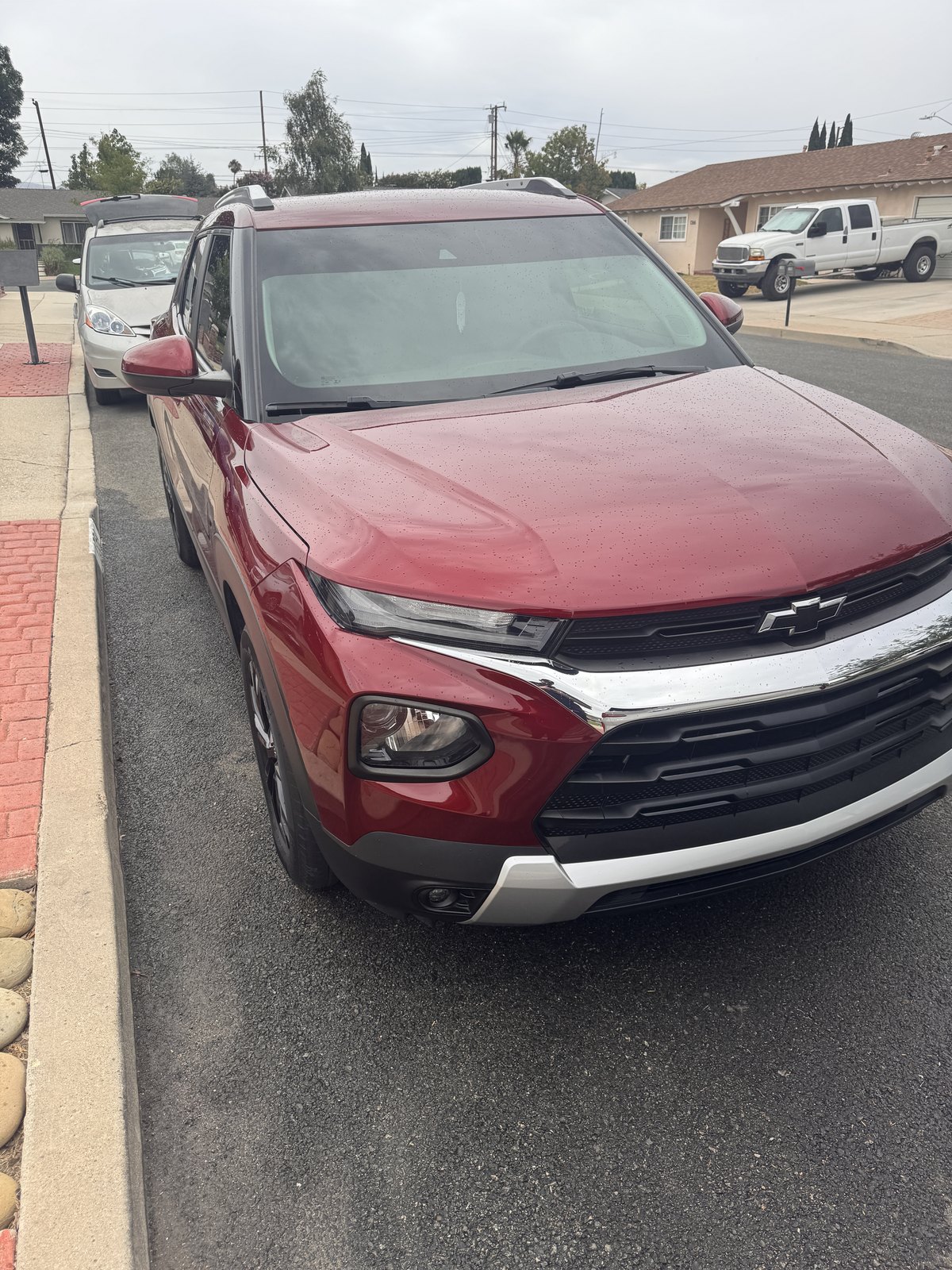 Red Chevrolet SUV after an exterior detail