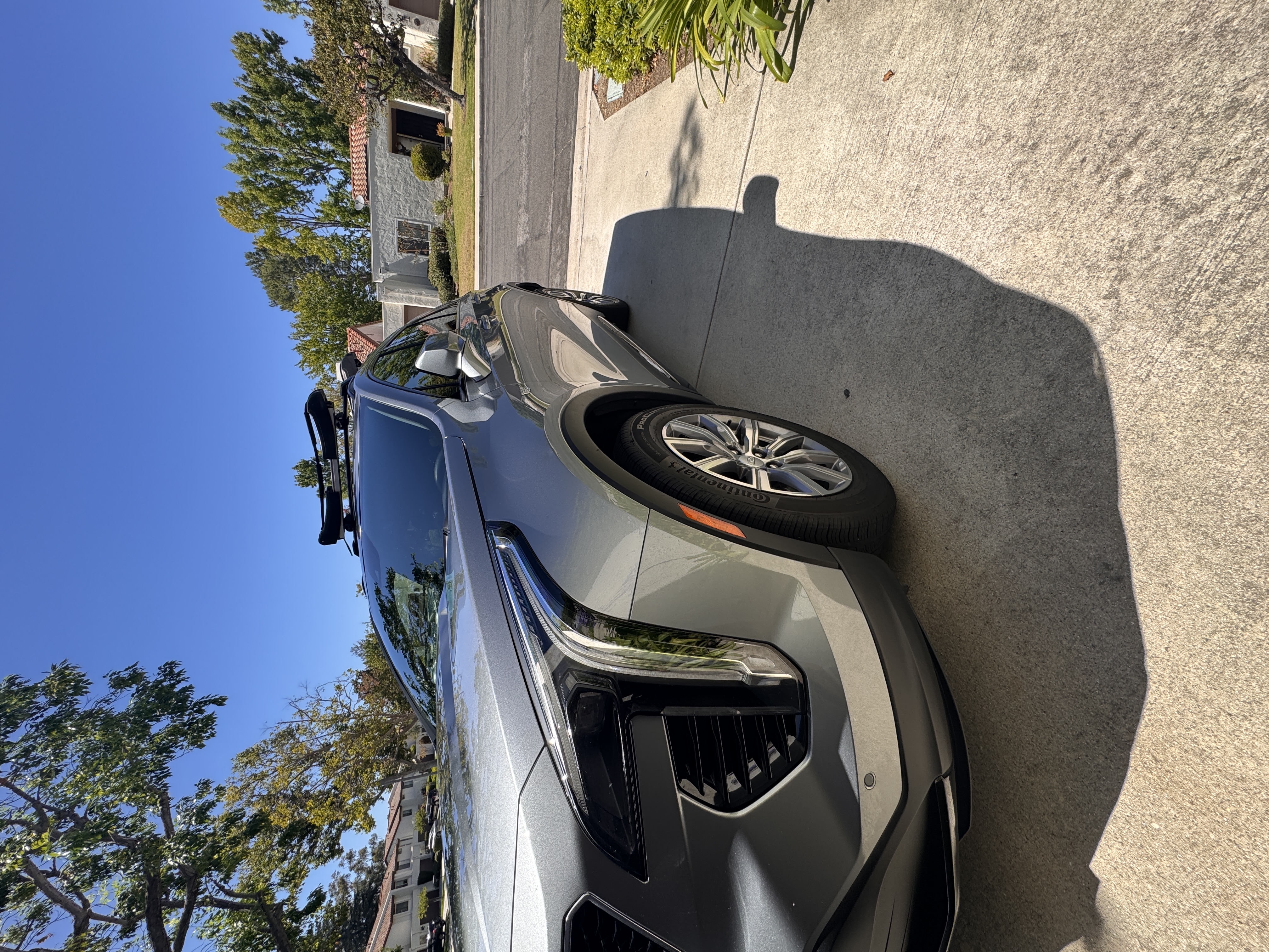 Detailed silver SUV parked in a driveway