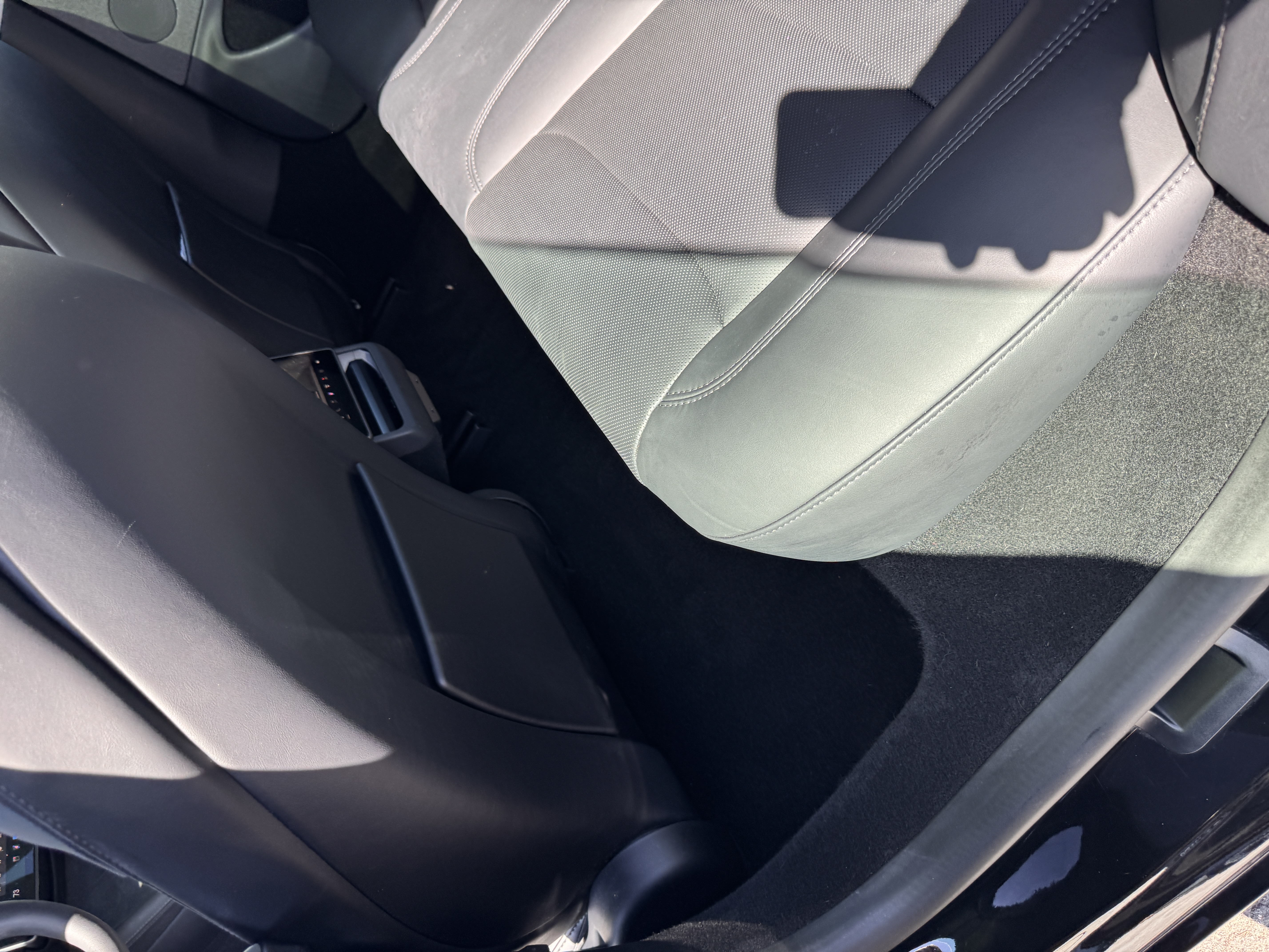 The same Tesla rear passenger area after cleaning